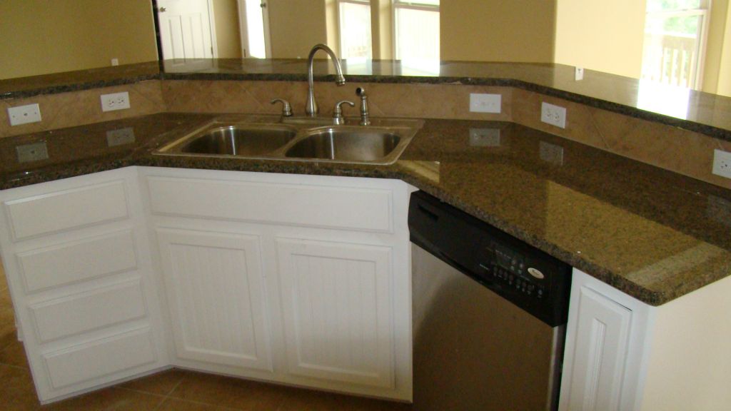 KITCHEN with GRANITE TOPS, SS APPLIANCES, CUSTOM CABINETS